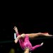 Nastia Liukin throwing a side aerial on beam