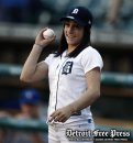 Olympic gold medalist Jordyn Wieber throws out the first pitch at a Detroit Tigers game