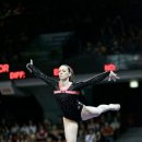 Chellsie Memmel mounts the beam 