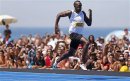 Usain Bolt Wins Copacabana Beach 150-Meter Race In Rio De Janeiro