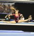 Kim Jacobs of Alabama on floor at 2013 NCAA Event Finals